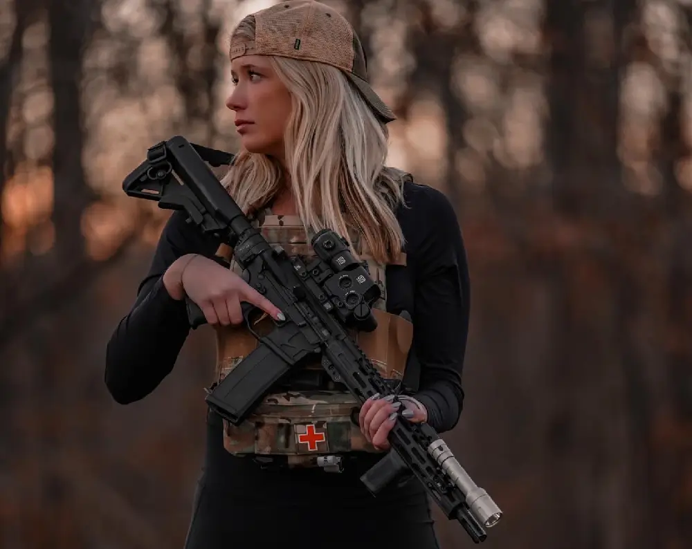 woman hunting with gun